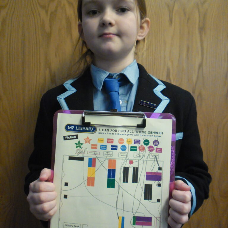 student holding a clipboard