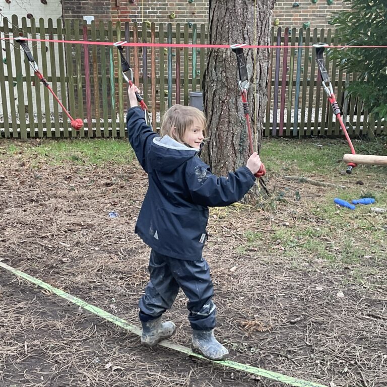 student on a walking rope