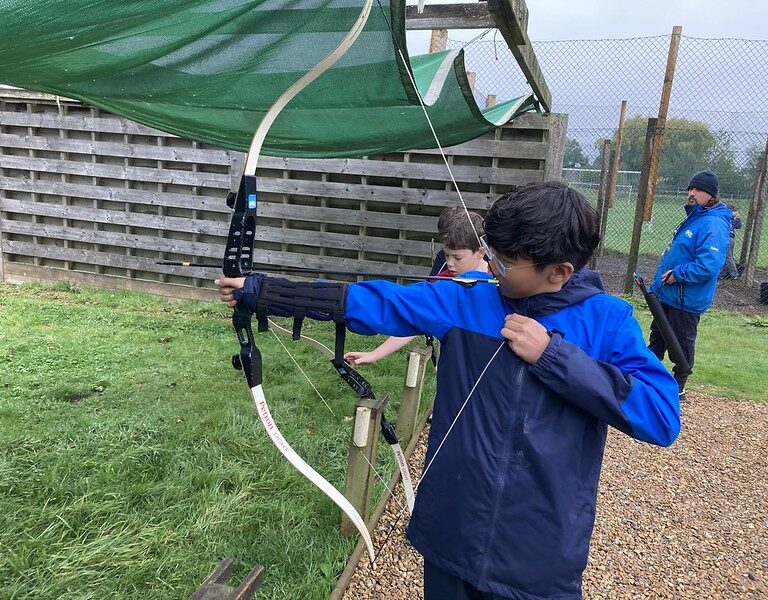 boy with a bow and arrow
