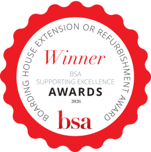 Award badge reading 'Winner' with surrounding circular text and year 2026 on a red scalloped seal background